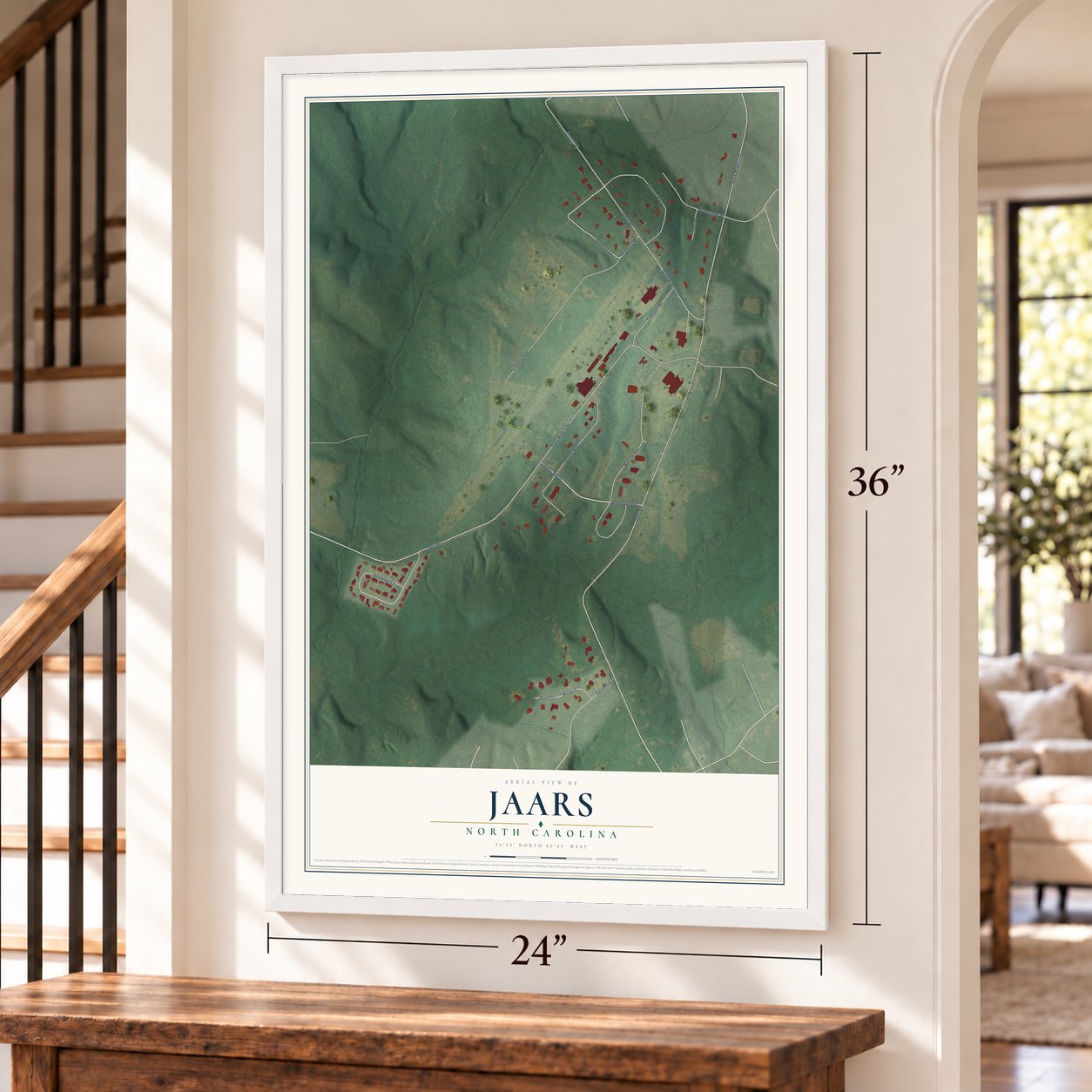 JAARS, North Carolina map, 24 x 36 inch print in a white frame by a staircase