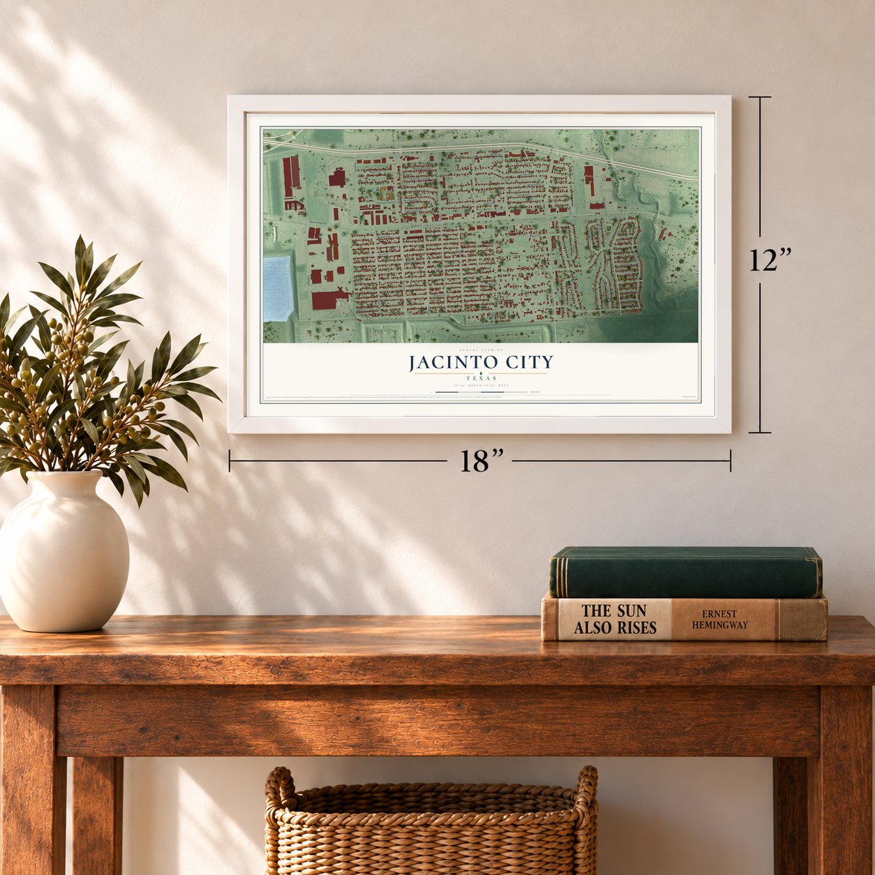 Jacinto City, Texas map, 12 x 18 inch print in a white frame in an entryway