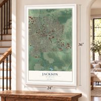 Jackson, Michigan map, 24 x 36 inch print in a white frame by a staircase