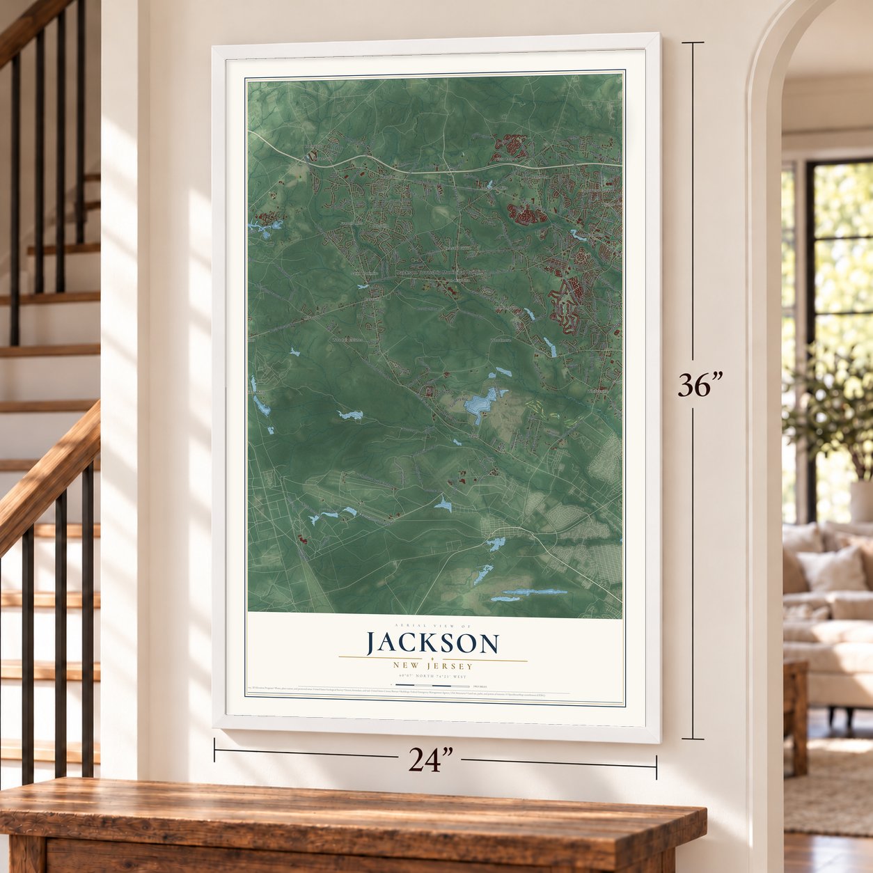 Jackson, New Jersey map, 24 x 36 inch print in a white frame by a staircase