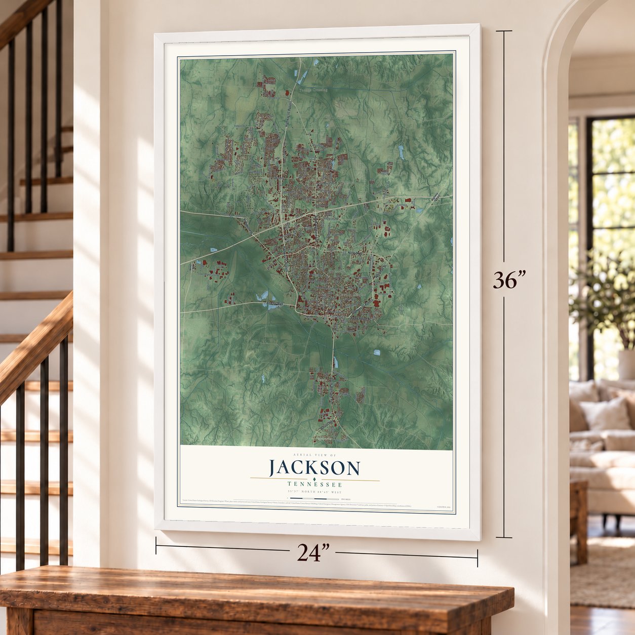 Jackson, Tennessee map, 24 x 36 inch print in a white frame by a staircase