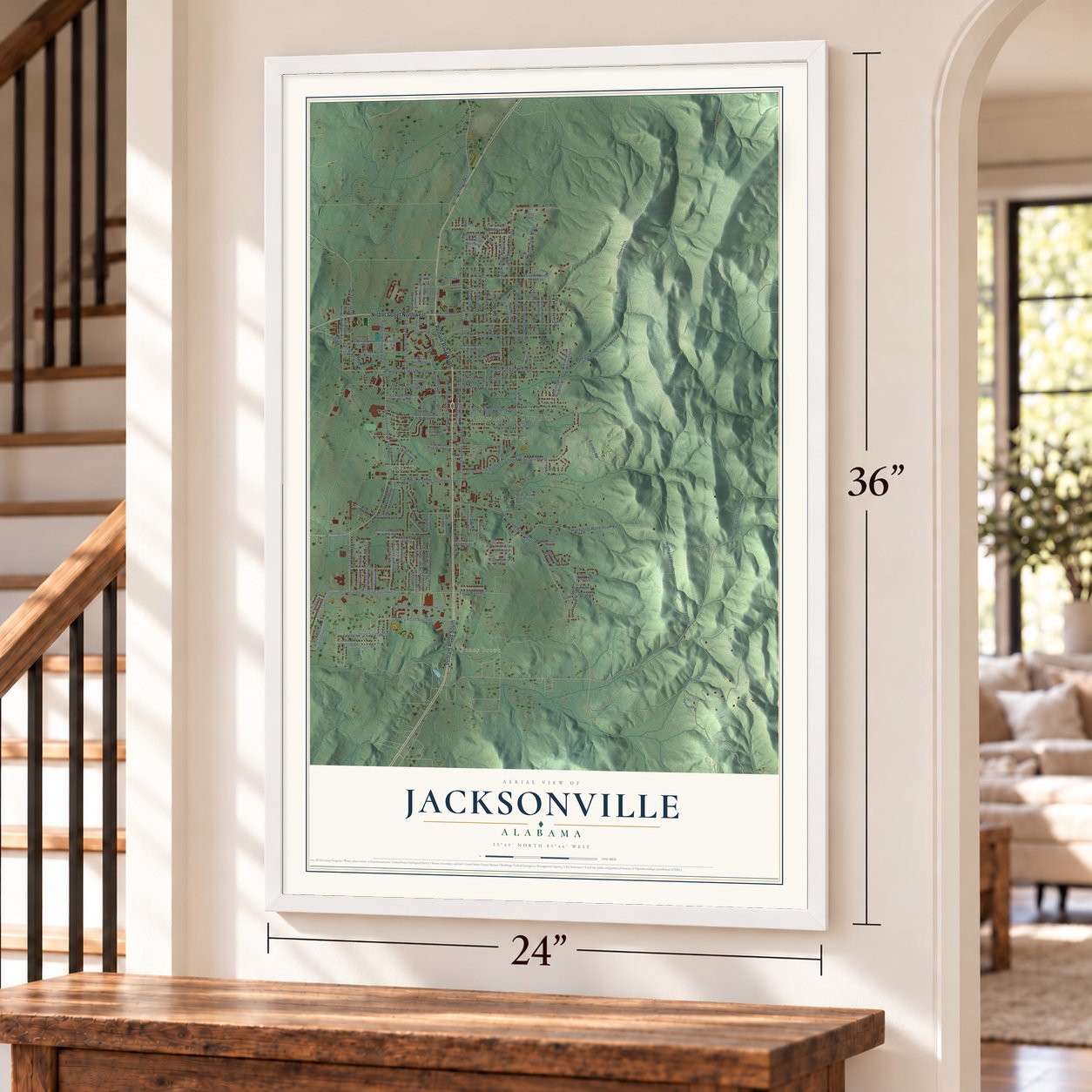 Jacksonville, Alabama map, 24 x 36 inch print in a white frame by a staircase