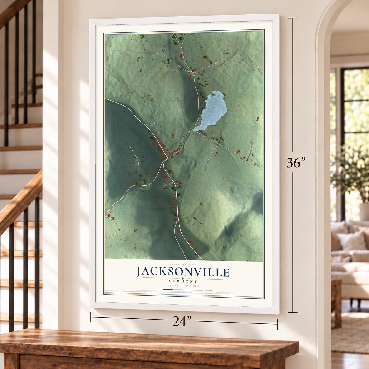 Jacksonville, Vermont map, 24 x 36 inch print in a white frame by a staircase