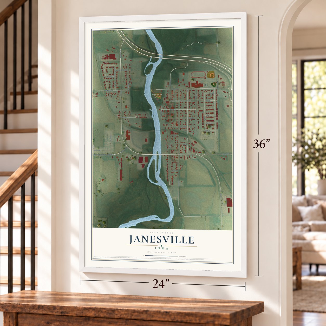 Janesville, Iowa map, 24 x 36 inch print in a white frame by a staircase