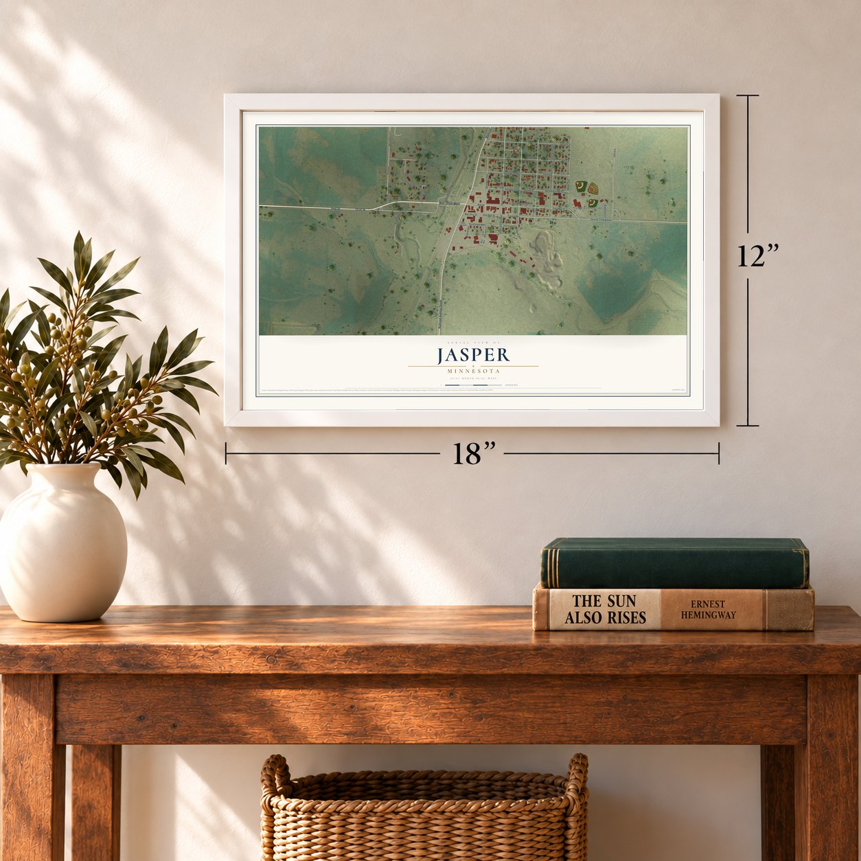 Jasper, Minnesota map, 12 x 18 inch print in a white frame in an entryway