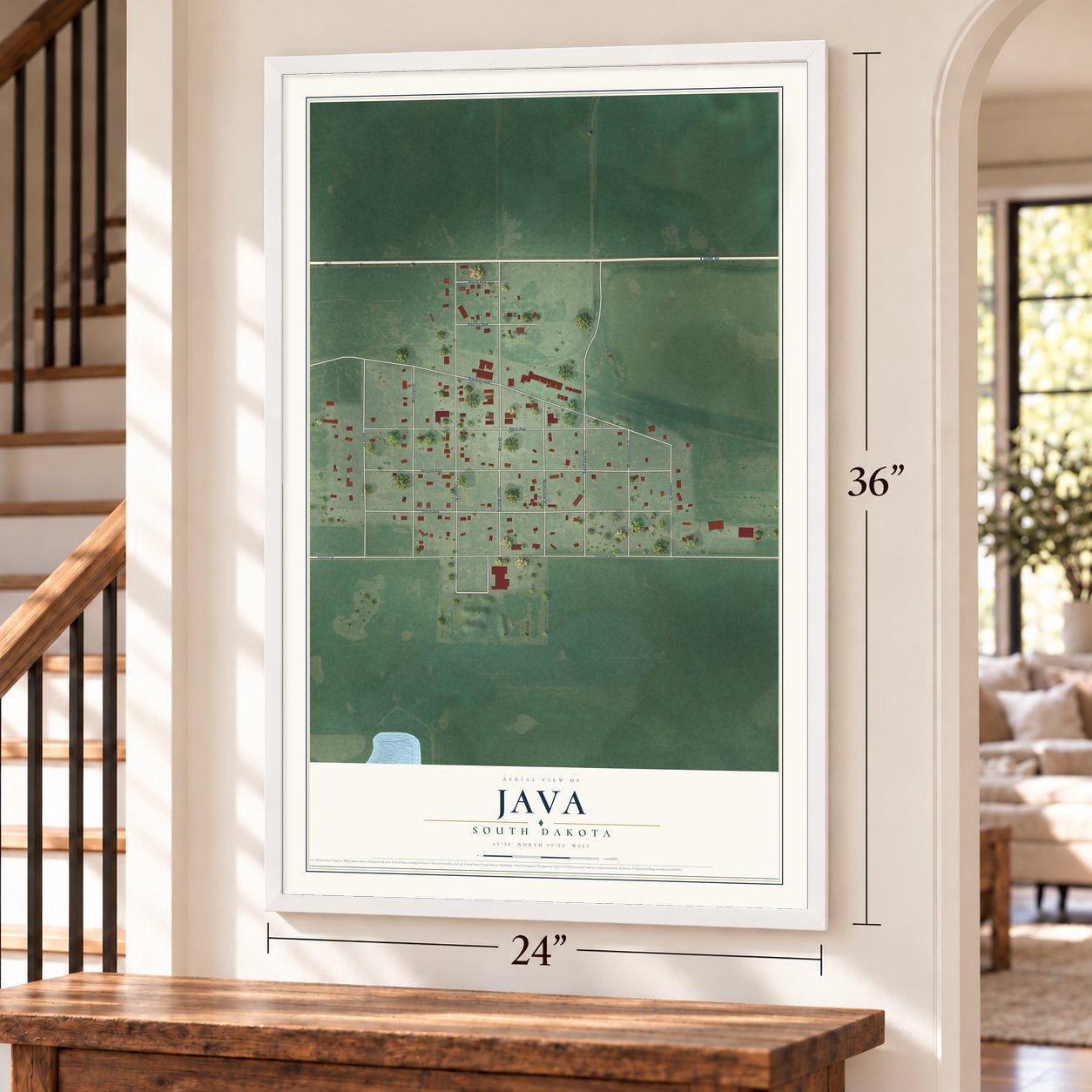 Java, South Dakota map, 24 x 36 inch print in a white frame by a staircase