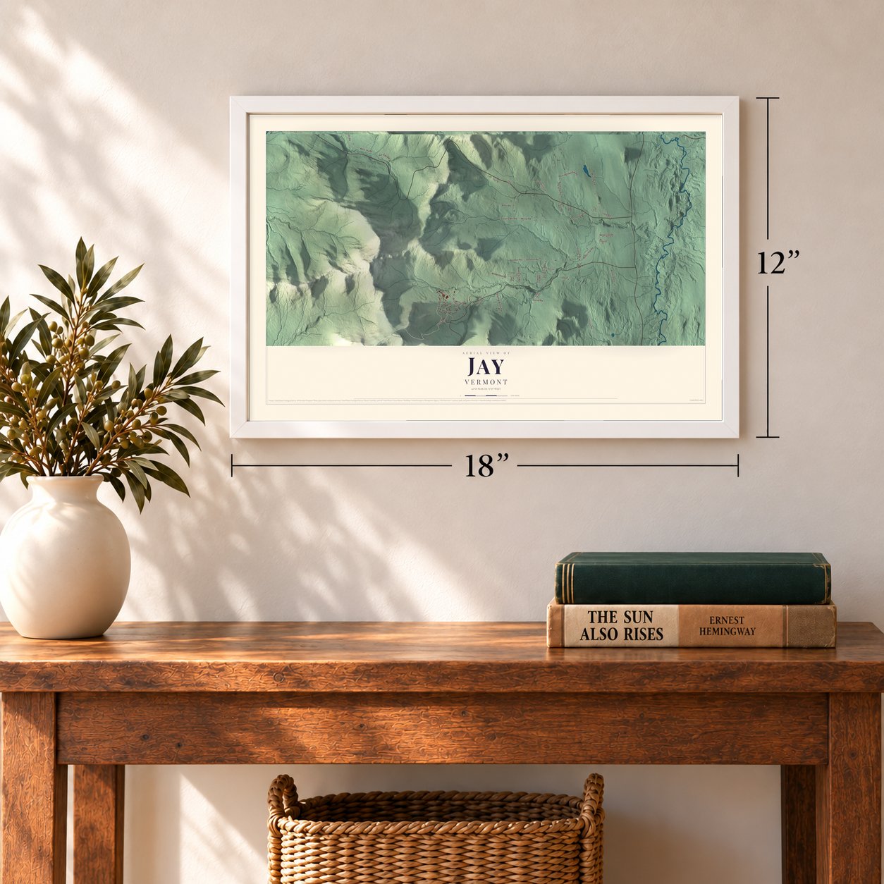Jay, Vermont map, 12 x 18 inch print in a white frame in an entryway