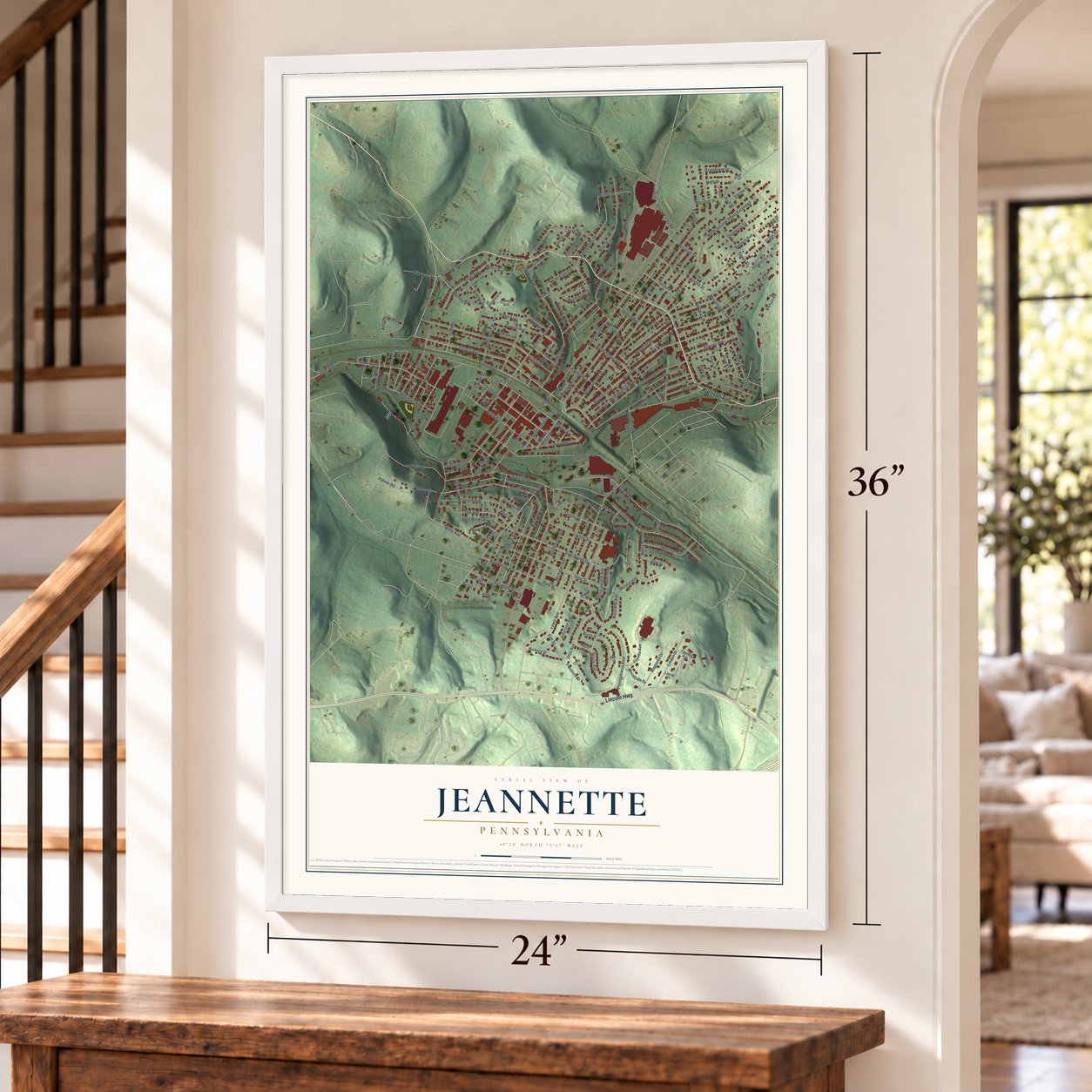 Jeannette, Pennsylvania map, 24 x 36 inch print in a white frame by a staircase