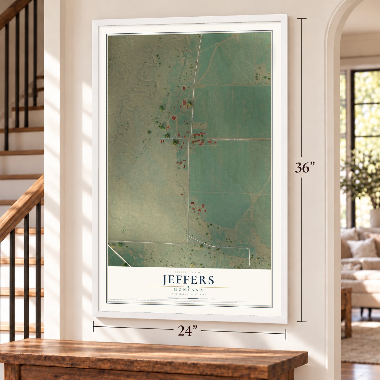 Jeffers, Montana map, 24 x 36 inch print in a white frame by a staircase