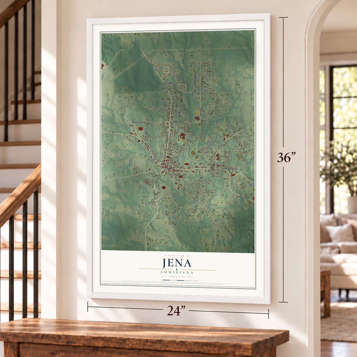 Jena, Louisiana map, 24 x 36 inch print in a white frame by a staircase