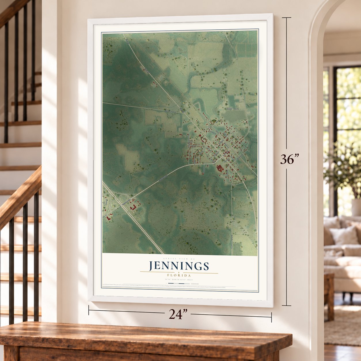 Jennings, Florida map, 24 x 36 inch print in a white frame by a staircase
