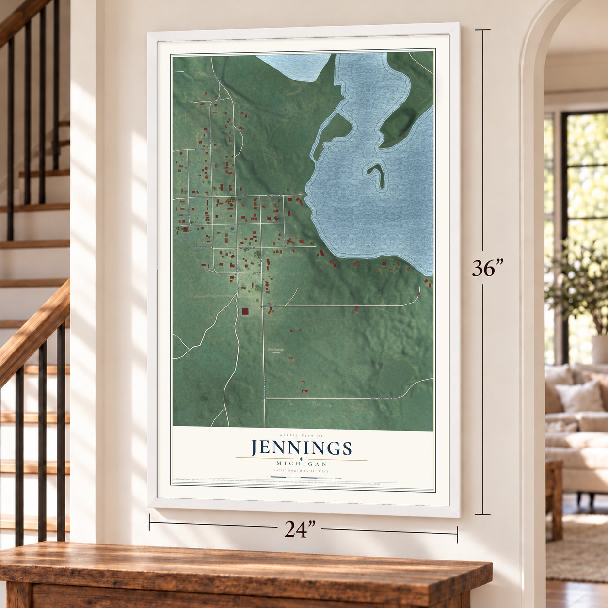 Jennings, Michigan map, 24 x 36 inch print in a white frame by a staircase