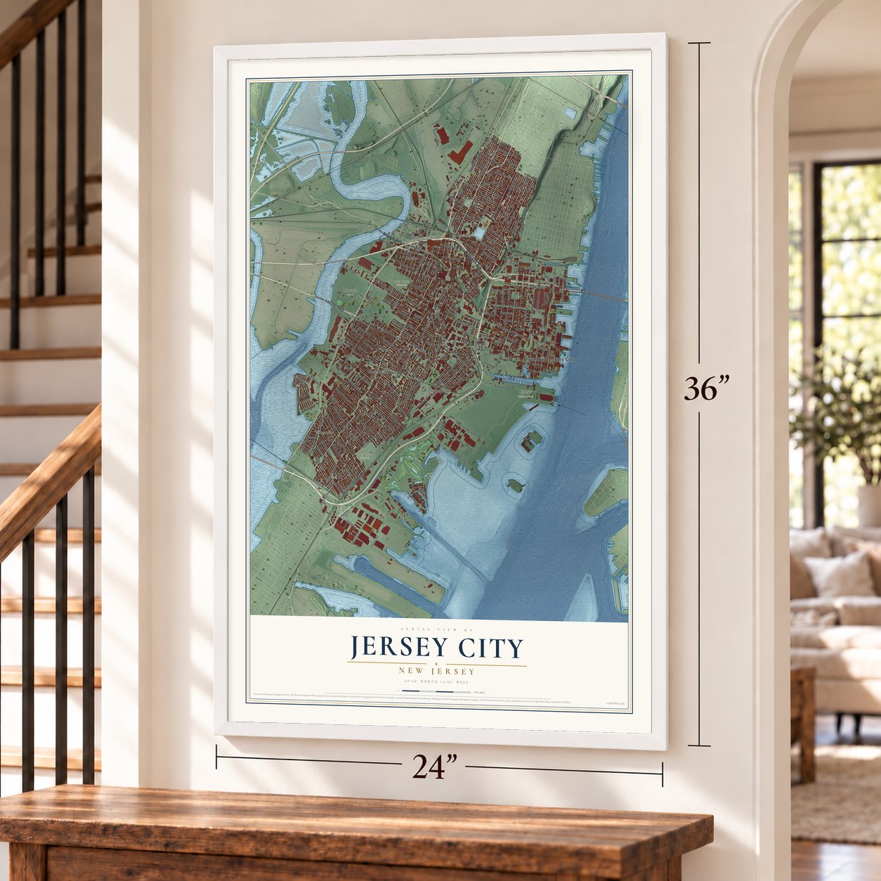 Jersey City, New Jersey map, 24 x 36 inch print in a white frame by a staircase