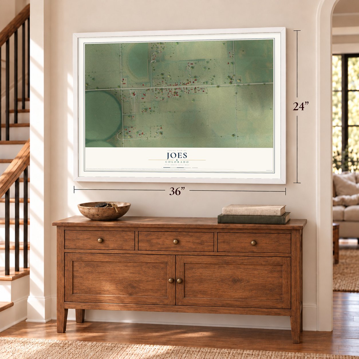 Joes, Colorado map, 24 x 36 inch print in a white frame above a dresser by a staircase