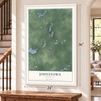Johnstown, Michigan map, 24 x 36 inch print in a white frame by a staircase