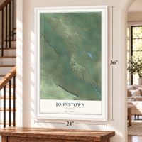 Johnstown, Wyoming map, 24 x 36 inch print in a white frame by a staircase