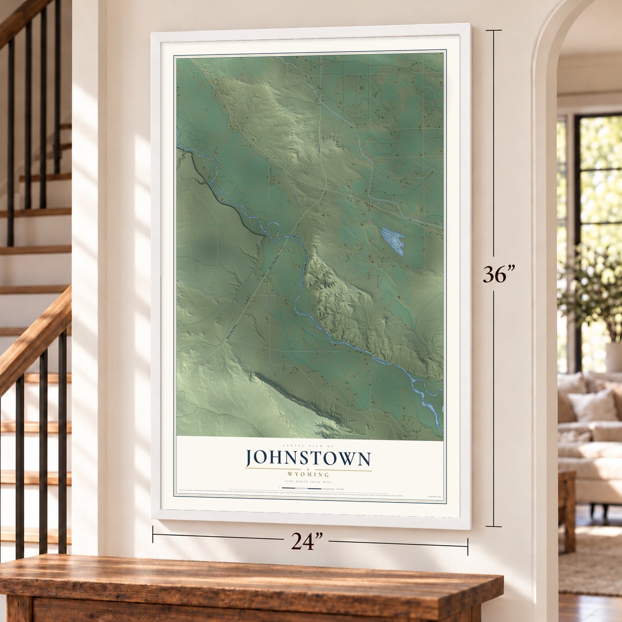 Johnstown, Wyoming map, 24 x 36 inch print in a white frame by a staircase
