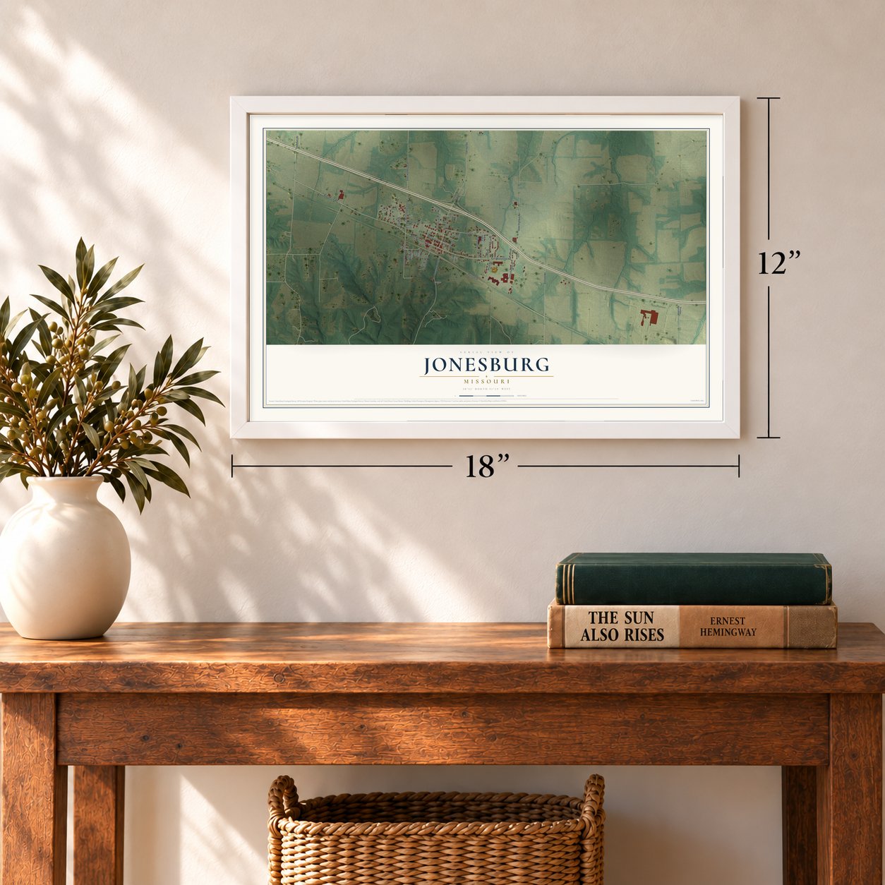 Jonesburg, Missouri map, 12 x 18 inch print in a white frame in an entryway