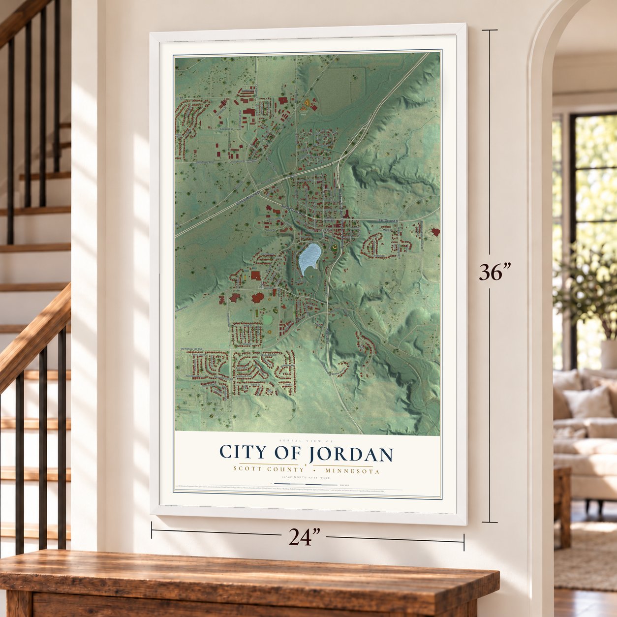 Jordan, Minnesota map, 24 x 36 inch print in a white frame by a staircase