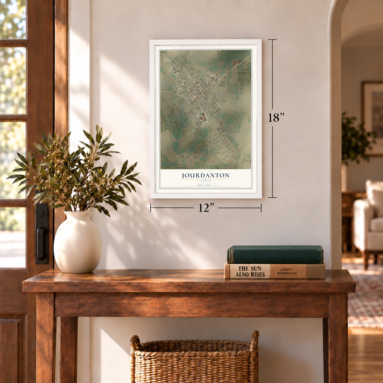 Jourdanton, Texas map, 12 x 18 inch print in a white frame in an entryway