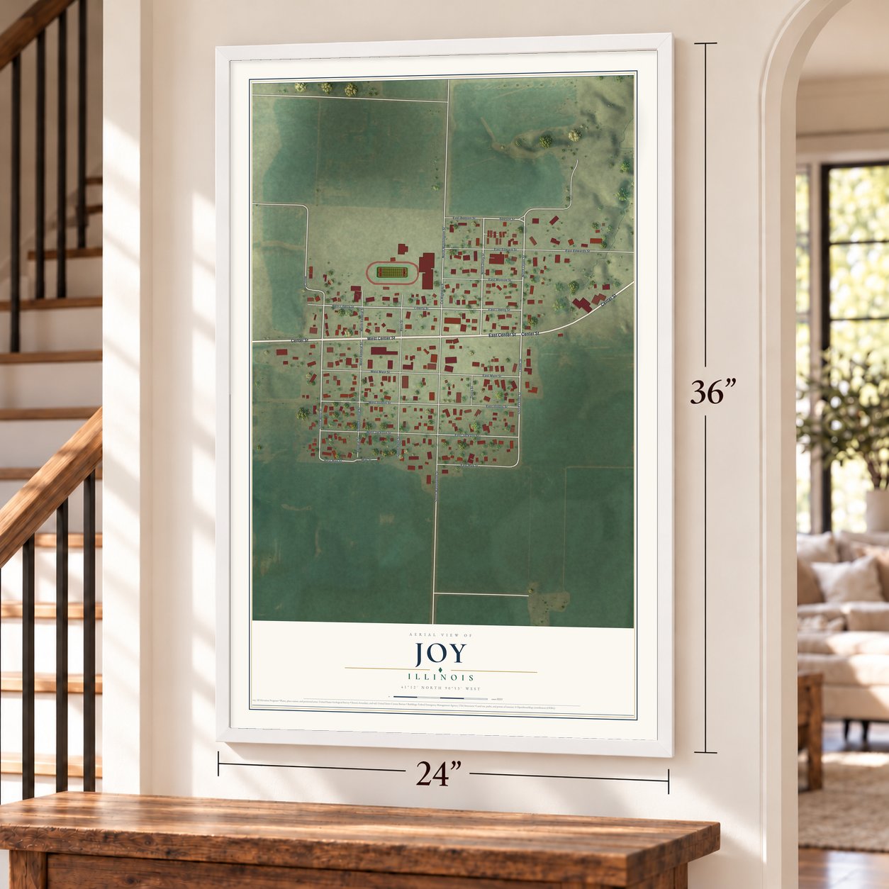 Joy, Illinois map, 24 x 36 inch print in a white frame by a staircase