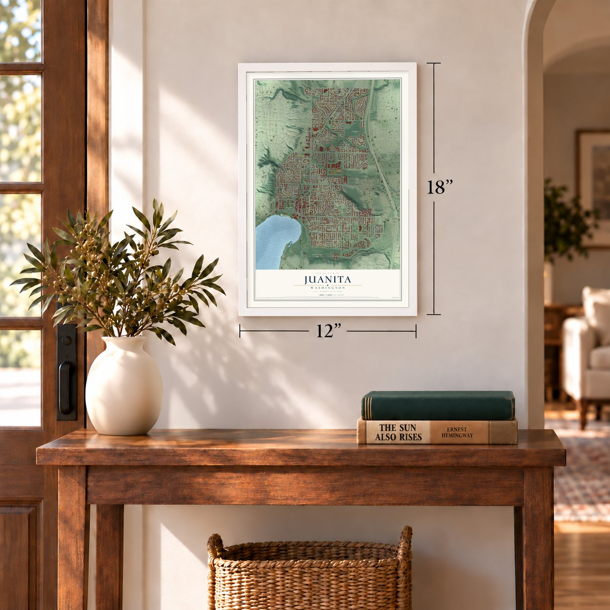 Juanita, Washington map, 12 x 18 inch print in a white frame in an entryway