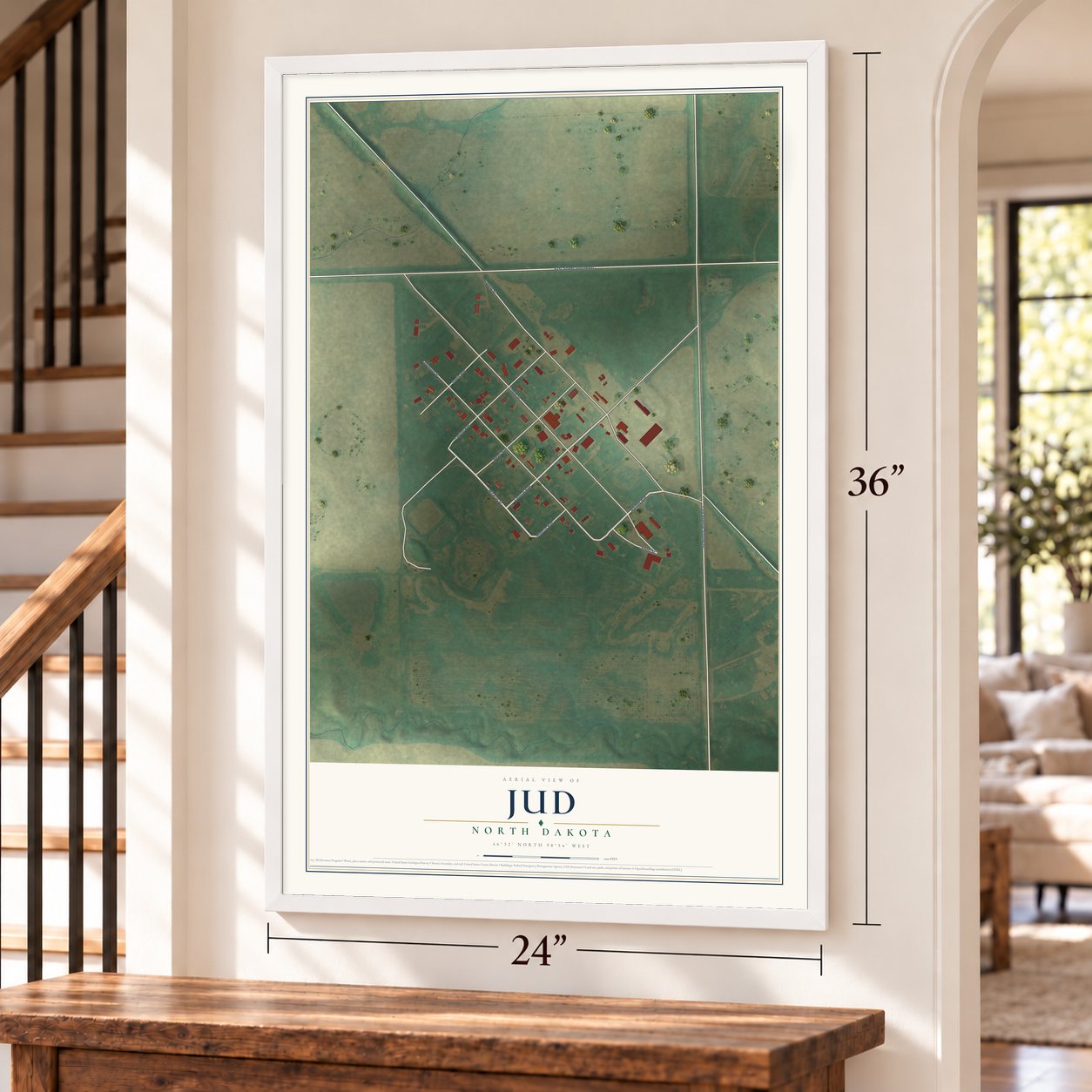 Jud, North Dakota map, 24 x 36 inch print in a white frame by a staircase