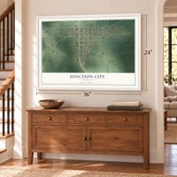 Junction City, Louisiana map, 24 x 36 inch print in a white frame above a dresser by a staircase