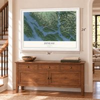 Juneau, Alaska map, 24 x 36 inch print in a white frame above a dresser by a staircase
