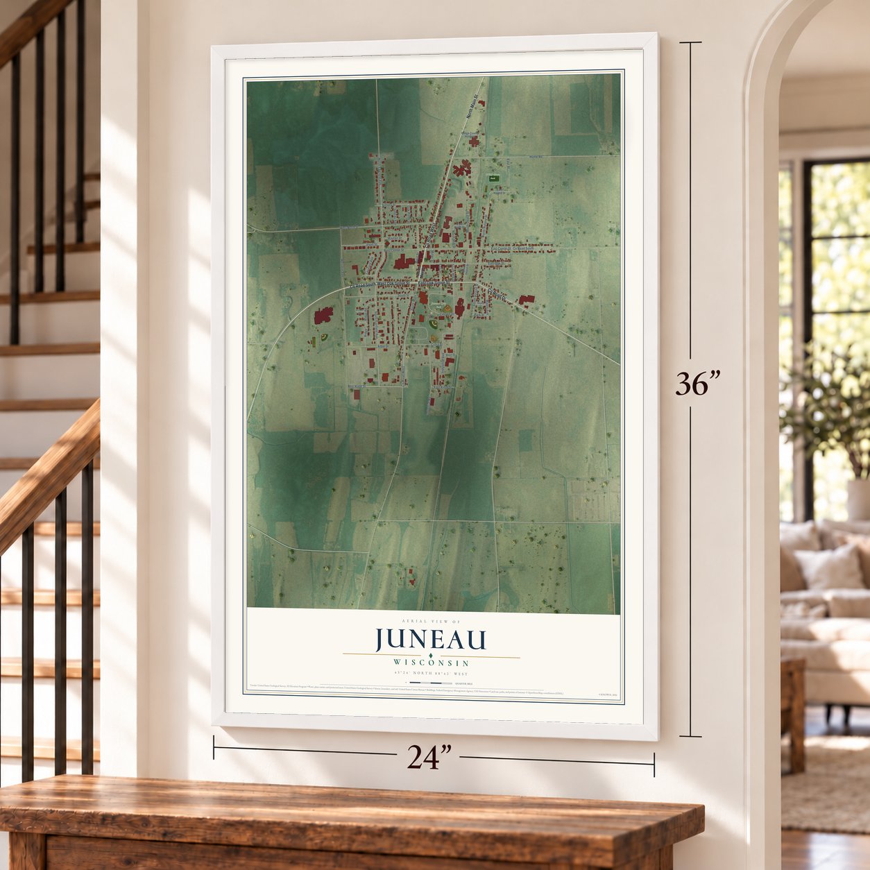 Juneau, Wisconsin map, 24 x 36 inch print in a white frame by a staircase