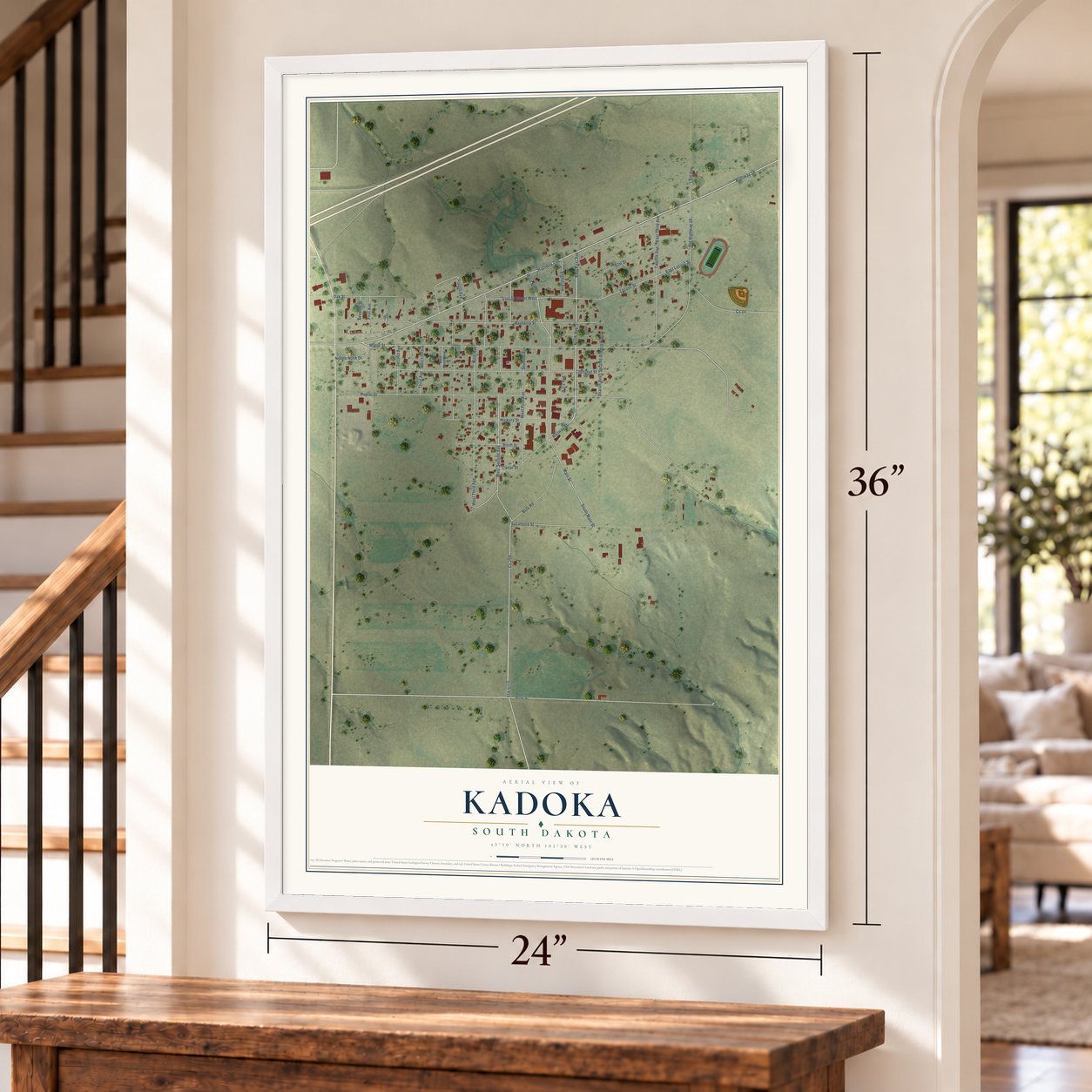 Kadoka, South Dakota map, 24 x 36 inch print in a white frame by a staircase