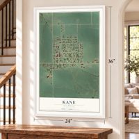 Kane, Illinois map, 24 x 36 inch print in a white frame by a staircase