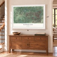 Kansas City, Kansas map, 24 x 36 inch print in a white frame above a dresser by a staircase
