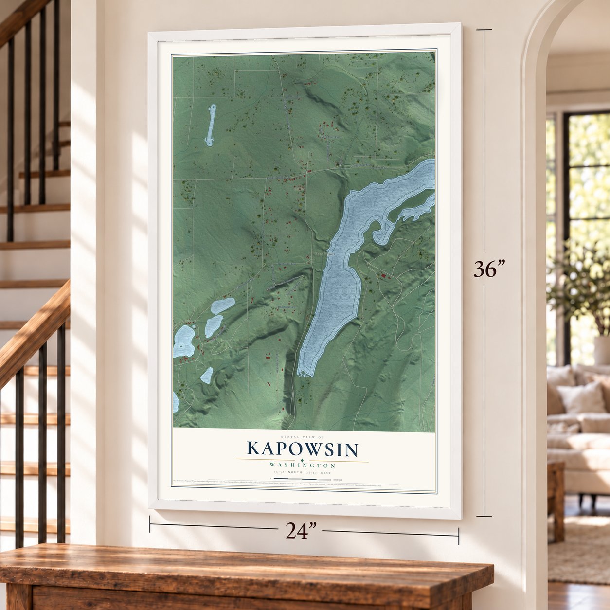 Kapowsin, Washington map, 24 x 36 inch print in a white frame by a staircase