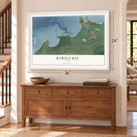Kawela Bay, Hawaii map, 24 x 36 inch print in a white frame above a dresser by a staircase
