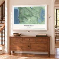 Kayak Point, Washington map, 24 x 36 inch print in a white frame above a dresser by a staircase