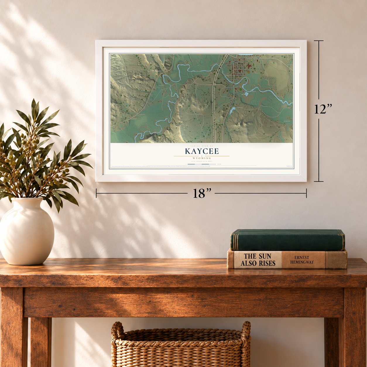 Kaycee, Wyoming map, 12 x 18 inch print in a white frame in an entryway