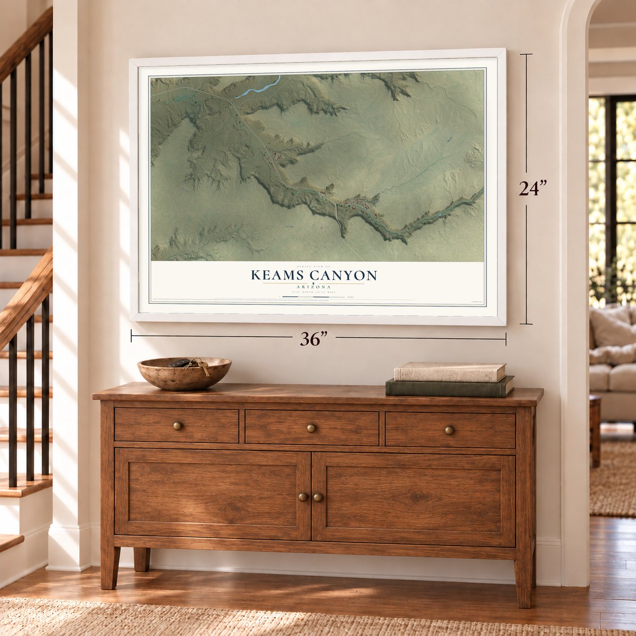 Keams Canyon, Arizona map, 24 x 36 inch print in a white frame above a dresser by a staircase