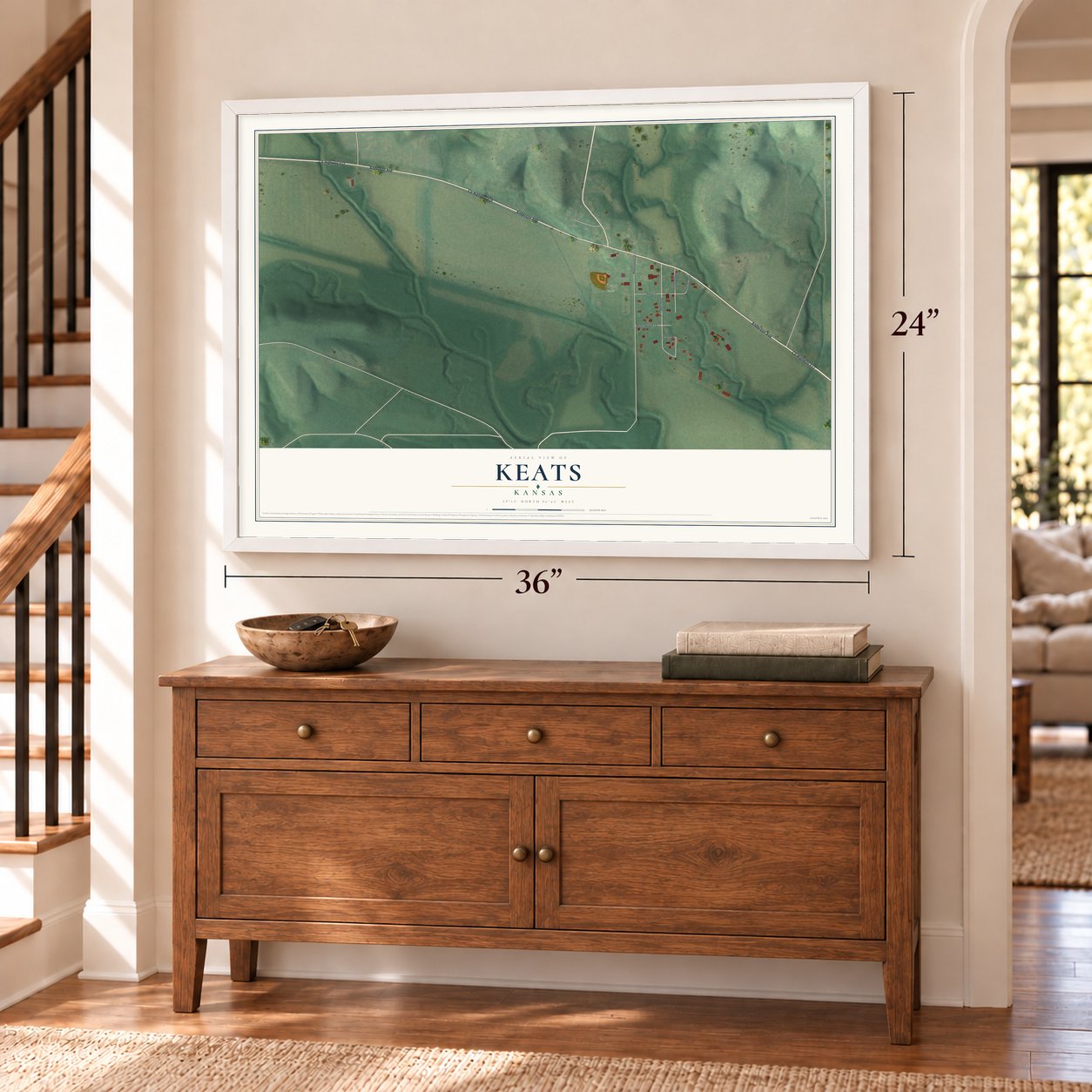 Keats, Kansas map, 24 x 36 inch print in a white frame above a dresser by a staircase