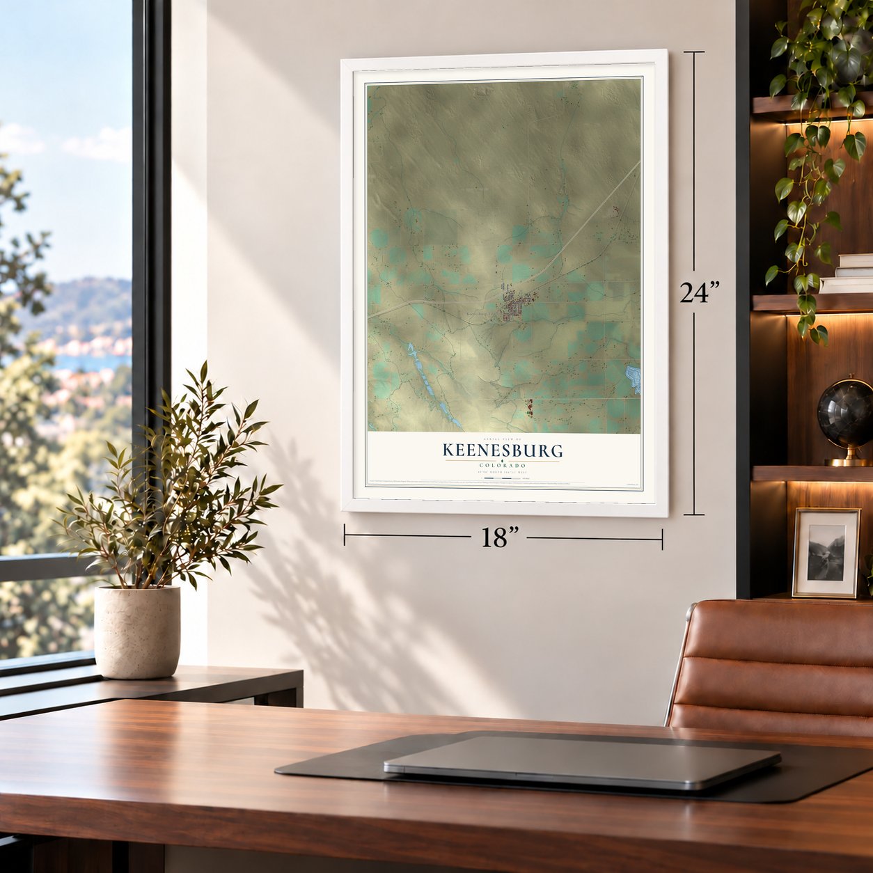 Keenesburg, Colorado map, 18 x 24 inch print in a white frame in a home office