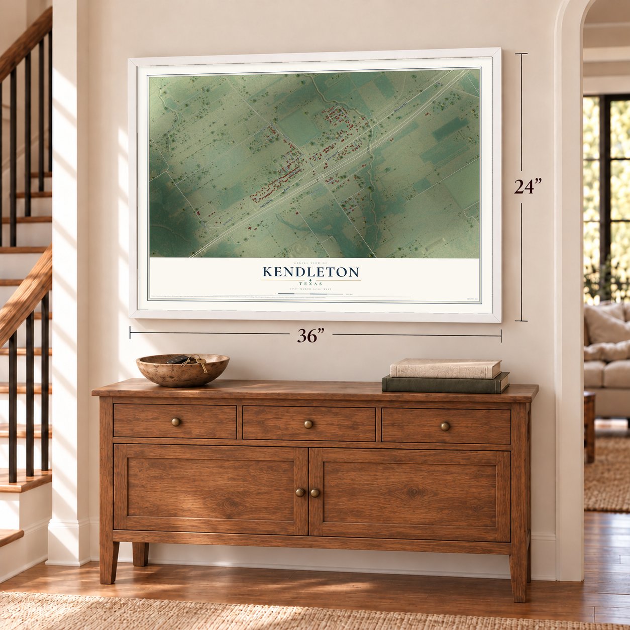 Kendleton, Texas map, 24 x 36 inch print in a white frame above a dresser by a staircase
