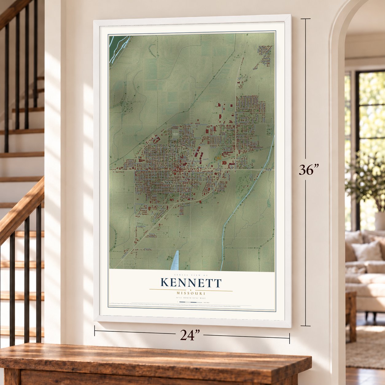 Kennett, Missouri map, 24 x 36 inch print in a white frame by a staircase