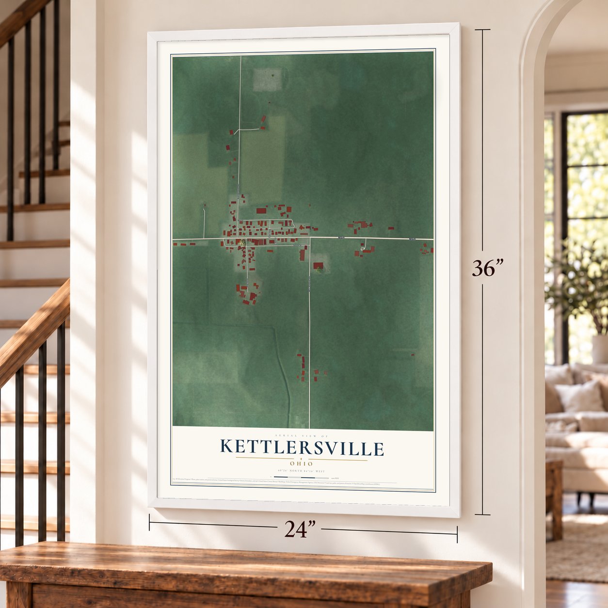 Kettlersville, Ohio map, 24 x 36 inch print in a white frame by a staircase