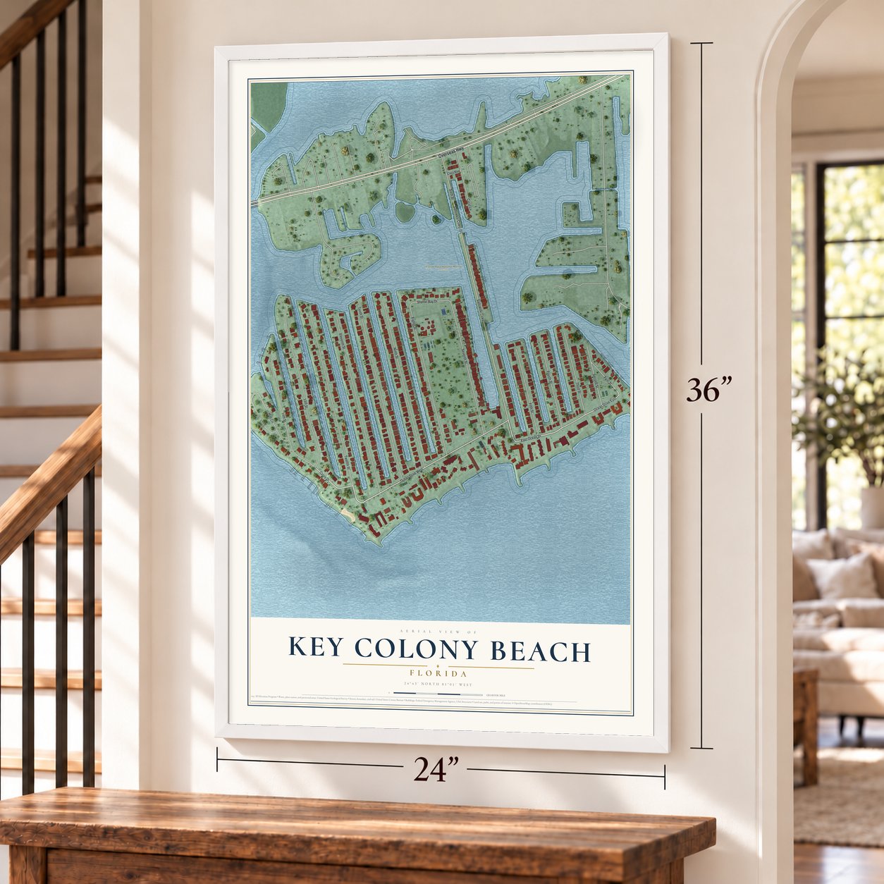 Key Colony Beach, Florida map, 24 x 36 inch print in a white frame by a staircase