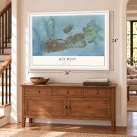 Key West, Florida map, 24 x 36 inch print in a white frame above a dresser by a staircase