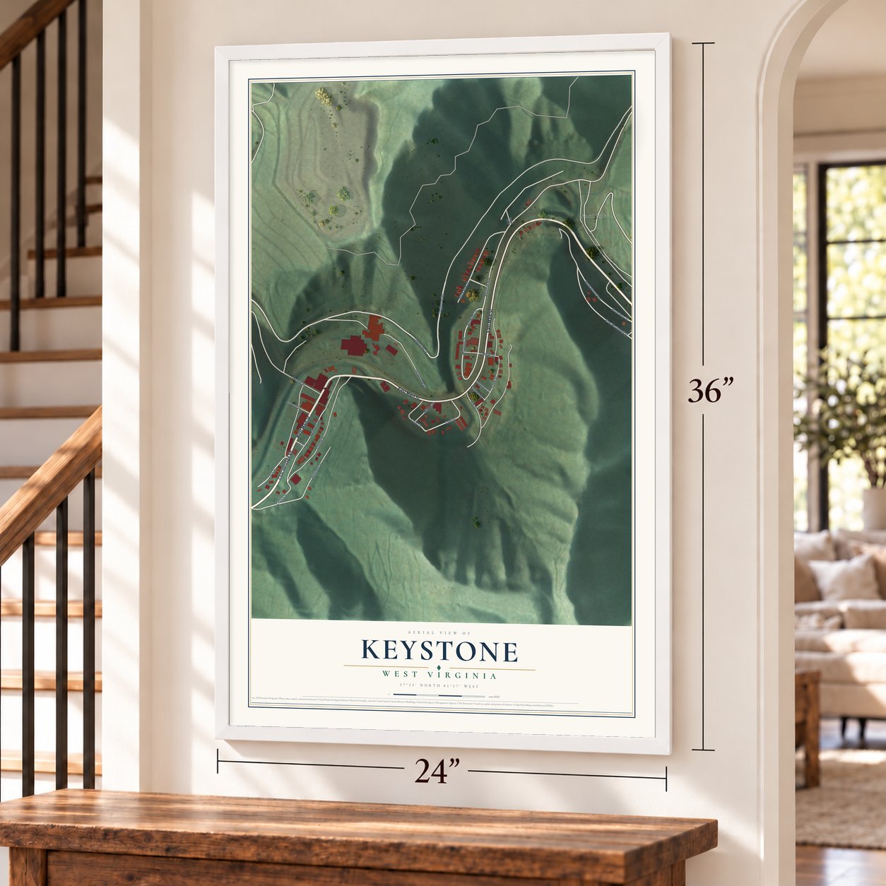 Keystone, West Virginia map, 24 x 36 inch print in a white frame by a staircase