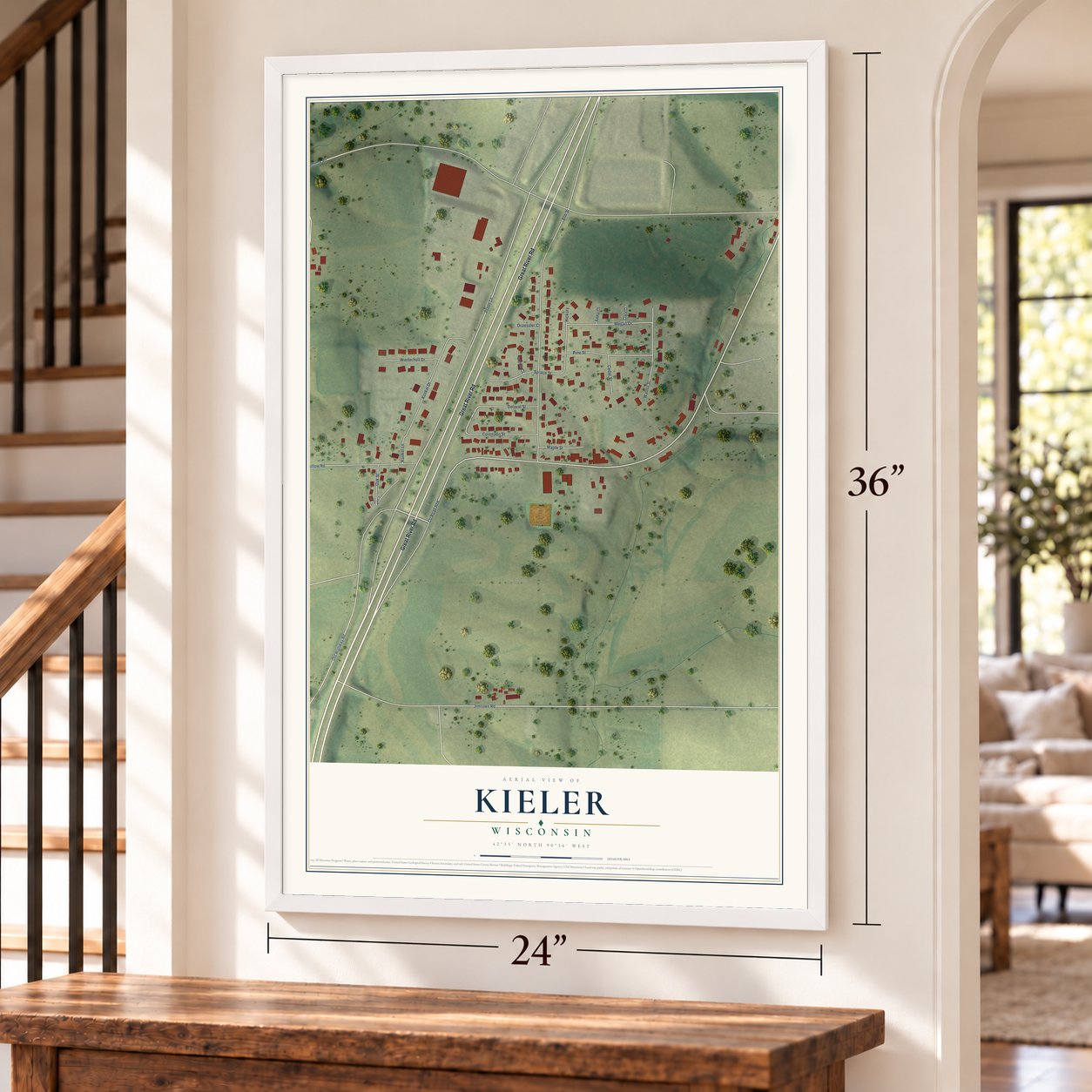 Kieler, Wisconsin map, 24 x 36 inch print in a white frame by a staircase