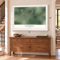 Kilbourne, Louisiana map, 24 x 36 inch print in a white frame above a dresser by a staircase