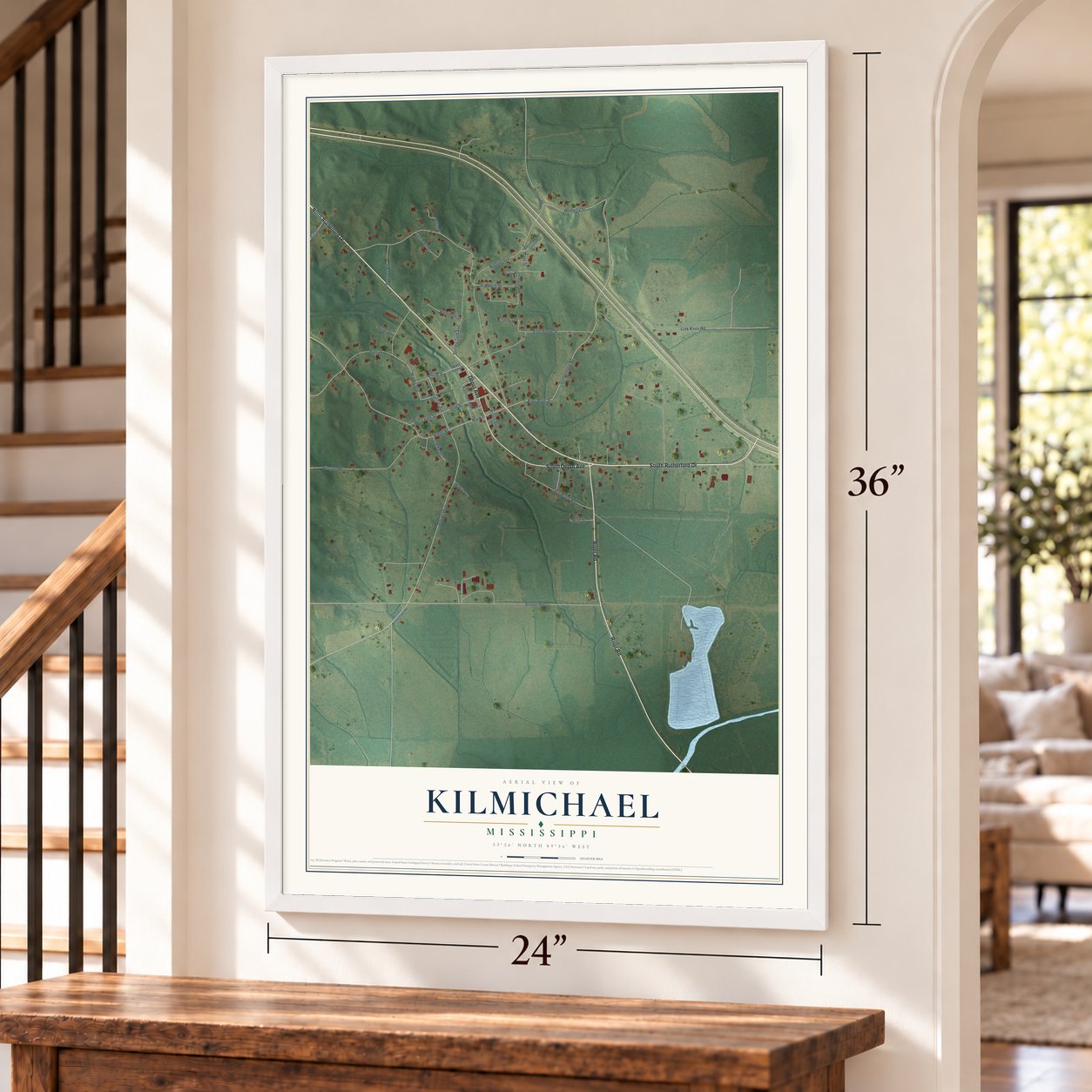 Kilmichael, Mississippi map, 24 x 36 inch print in a white frame by a staircase