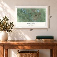 Kingsford, Michigan map, 12 x 18 inch print in a white frame in an entryway